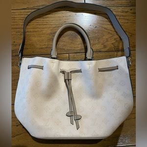 Purse light pink and taupe color